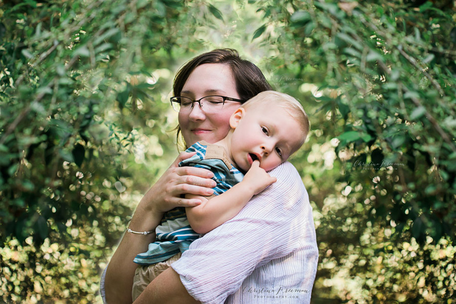 Mother-holding-two-year-old